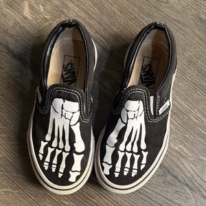 Vans Kids Slip-On Shoes with White Skeleton Graphic - Black